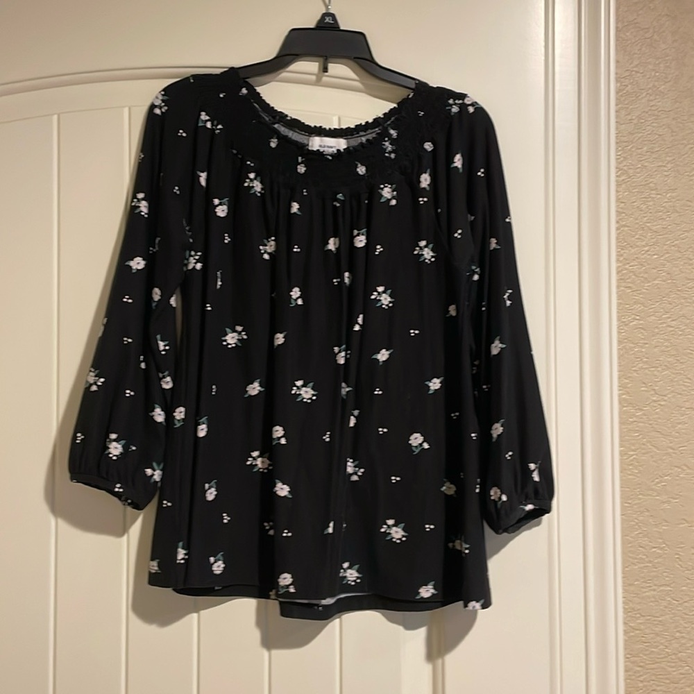 Adorable smocked floral top!